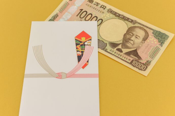 画像：簡易ご祝儀袋と1万円